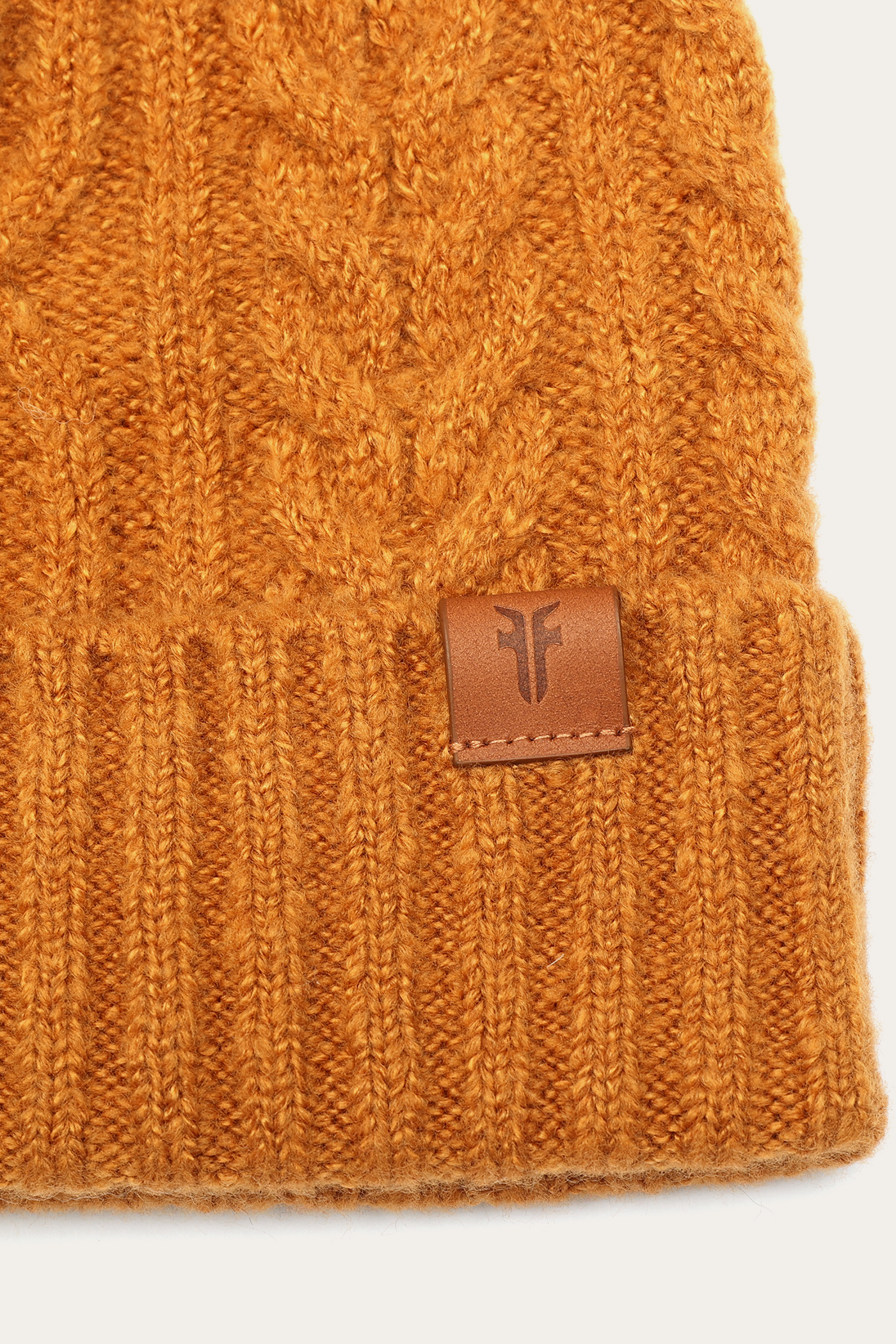 Cable Beanie With Self Pom